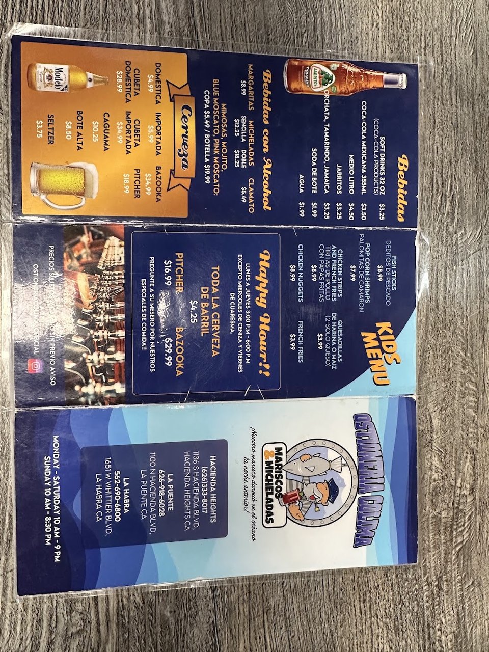Seafood menu featuring ceviche and shrimp plates.