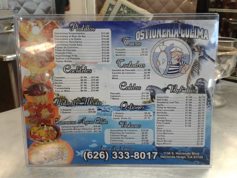 Printed menu with cocktails and small plates.